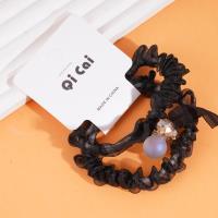 2 colorful bead ribbons with a hoop-shaped belt and a rubber band for tying hair