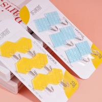 Six diamond-shaped adhesive hooks