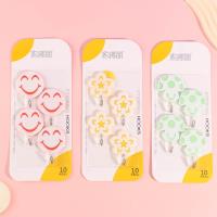 Four mushroom-shaped hooks