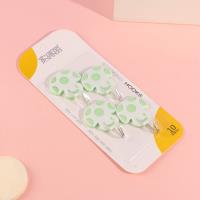 Four mushroom-shaped hooks