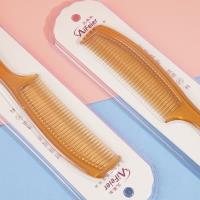 مشط بلون الذهبي والبني D0690