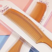 مشط بلون الذهبي والبني D0690