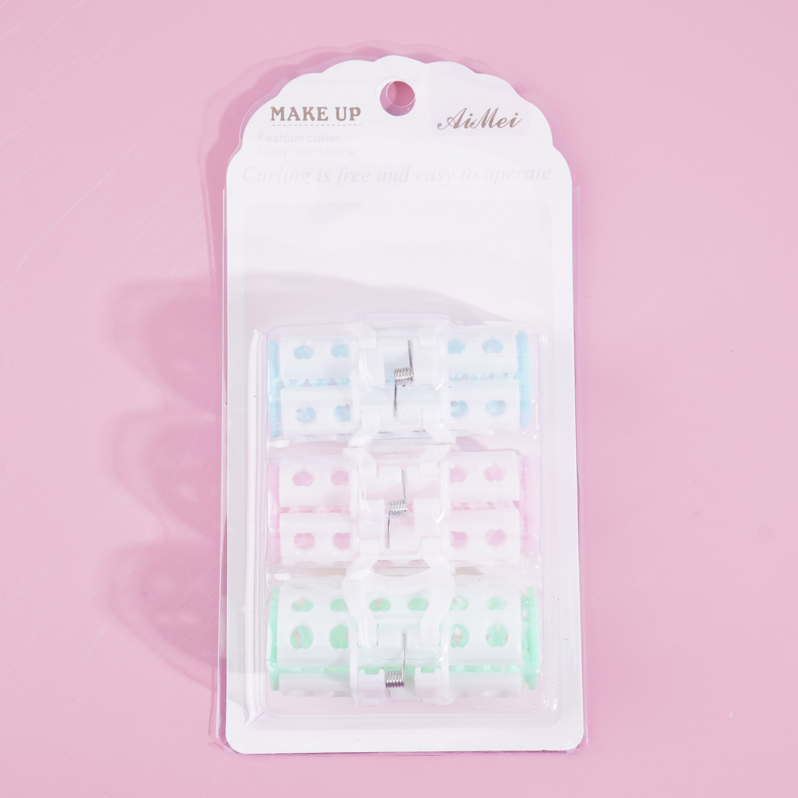 Three white clip-in hair extensions