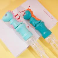 مظلة الديناصور مع أنبوب الفقاعات والماء والعصا القابلة للرش.