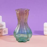 15 petits vases en forme de tête d'ail.
