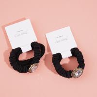 2 boxes of round-cut diamonds, including headbands and rubber bands