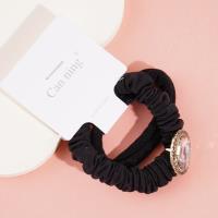 2 boxes of round-cut diamonds, including headbands and rubber bands