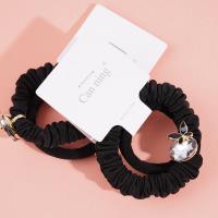 2 pairs of butterfly-shaped jewelry boxes, each containing a headband and elastic bands