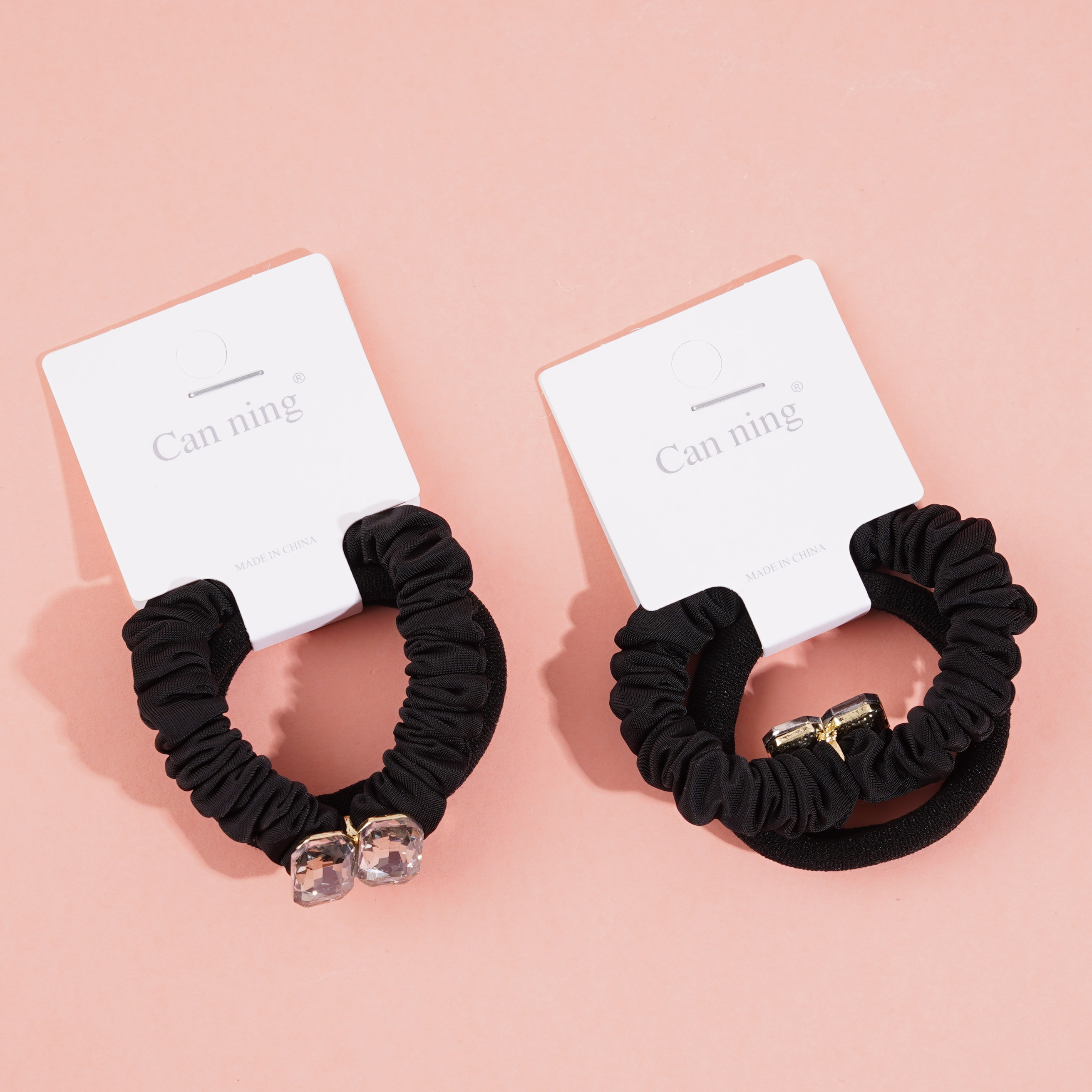 2 boxes of square sugar cubes, containing headbands and hair ties