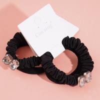 2 boxes of square sugar cubes, containing headbands and hair ties