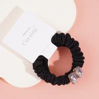 2 boxes of square sugar cubes, containing headbands and hair ties