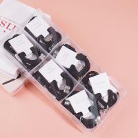 2 boxes of square sugar cubes, containing headbands and hair ties