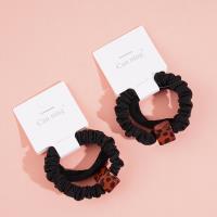 2 square leopard-print headbands with elastic bands, packaged in a box