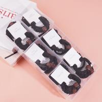 2 square leopard-print headbands with elastic bands, packaged in a box