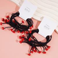 3 pieces of rubber bands with bear heads and small red beads at the ends