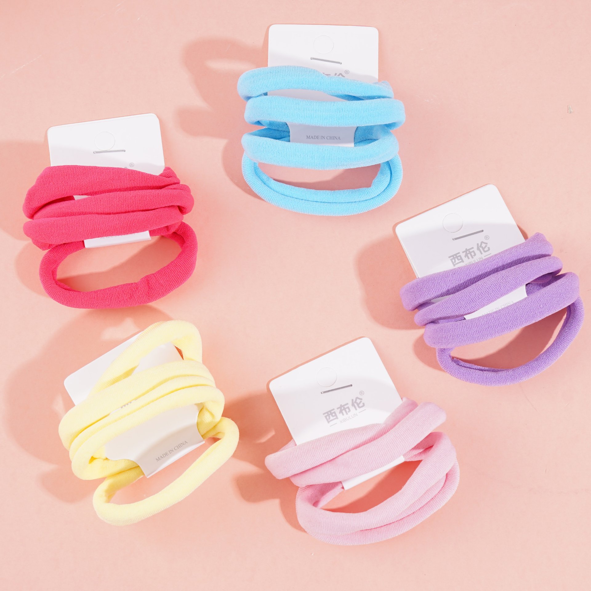 5 colorful towel looped head ropes and rubber bands