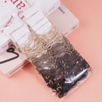 2 gold bead-decorated string elastics