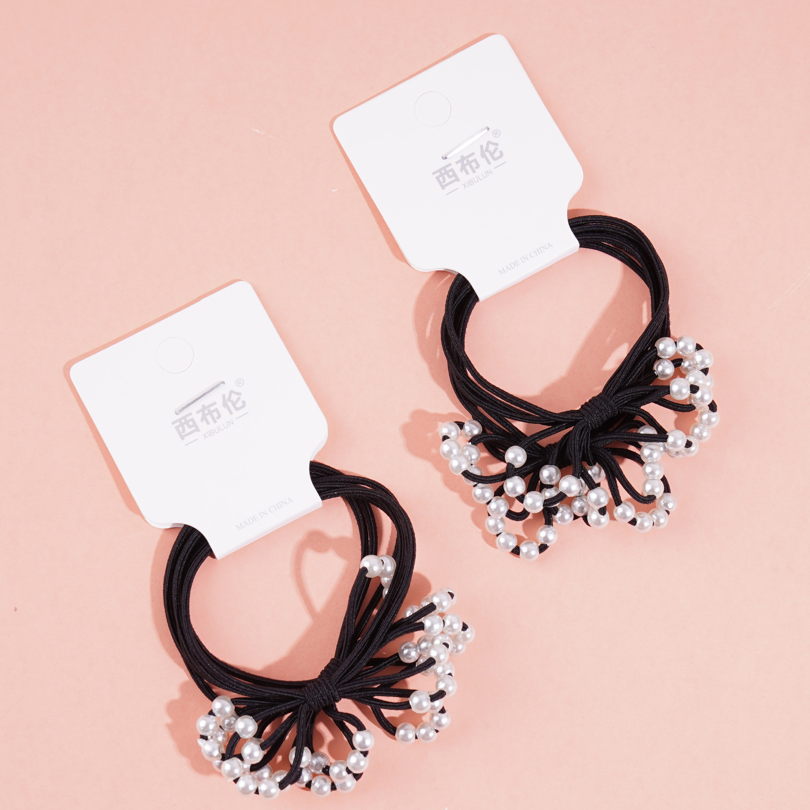 2 black pearl knot headbands with elastic bands