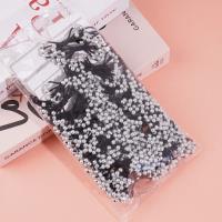 2 black pearl knot headbands with elastic bands