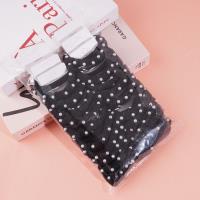 A set of three pearl sausage-shaped hair ties with a combined headband and elastic band design