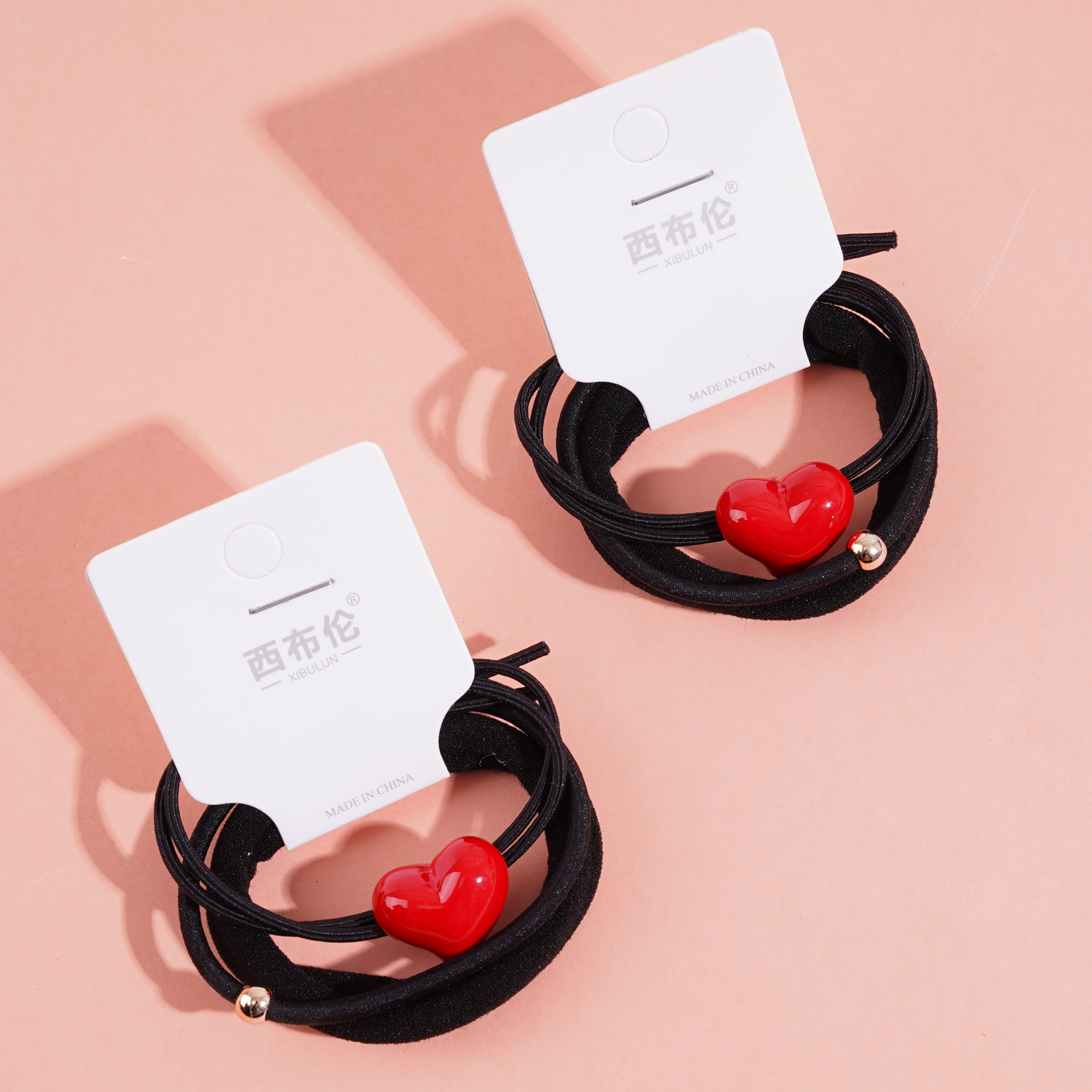 3 red-hearted combined headbands and rubber bands