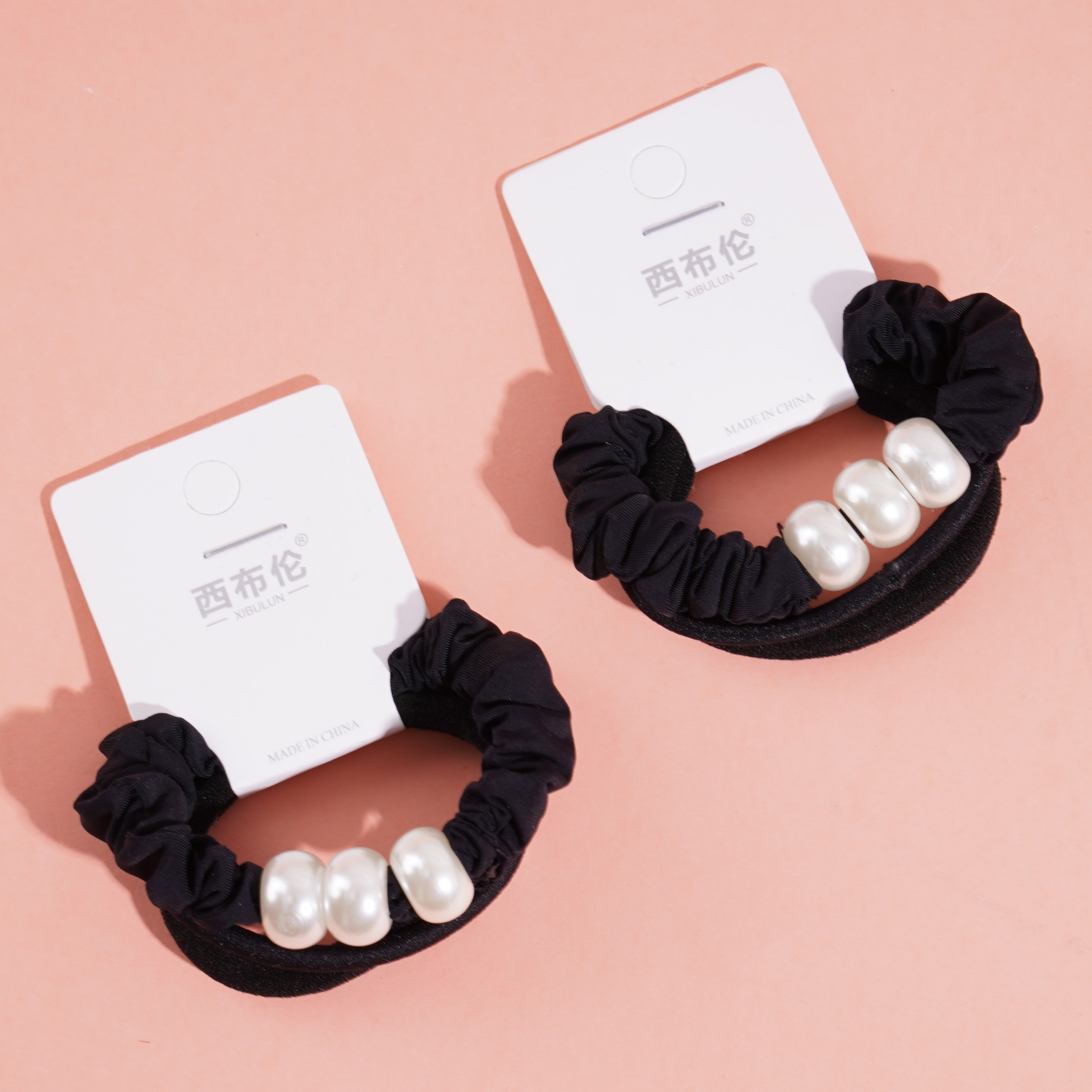 3 large black pearl headbands with elastic bands