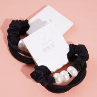 3 large black pearl headbands with elastic bands