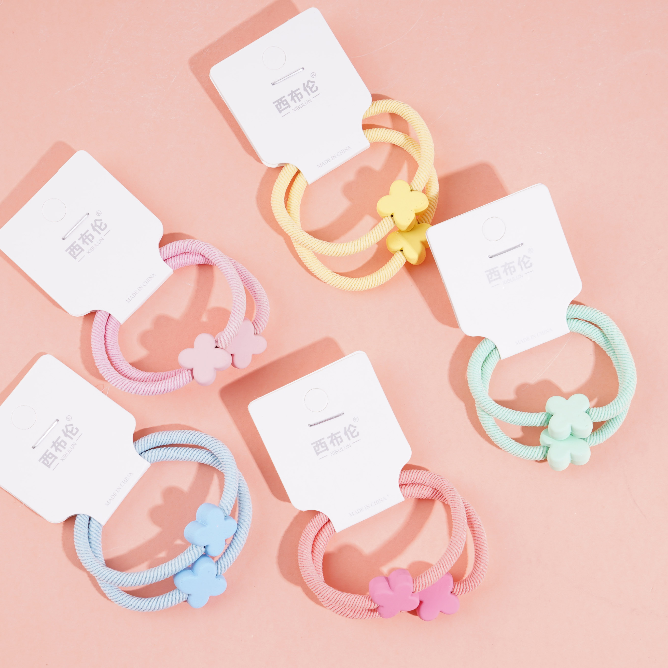 2 colorful four-leaf clover headbands with elastic bands