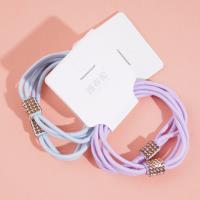 2 colorful square diamond-shaped rubber bands