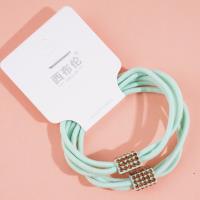 2 colorful square diamond-shaped rubber bands