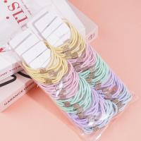 2 colorful square diamond-shaped rubber bands