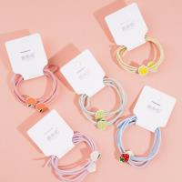 2 colorful fruit-themed rubber bands for hair ties