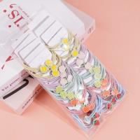 2 colorful fruit-themed rubber bands for hair ties