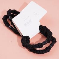 2 round braided headbands with elastic bands