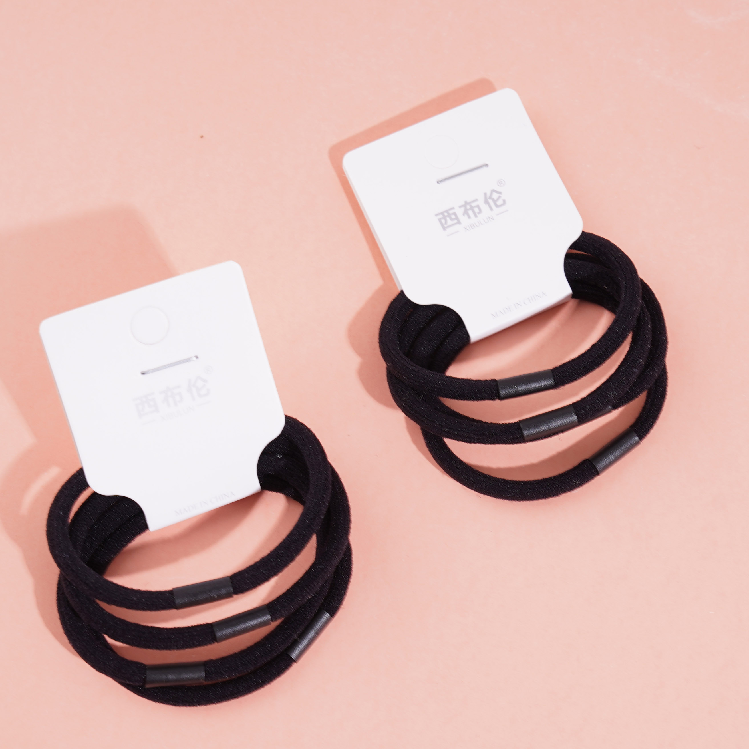4 black thick-headed rope rubber bands