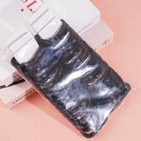 2 black flat beads with thickened heads and rubber bands