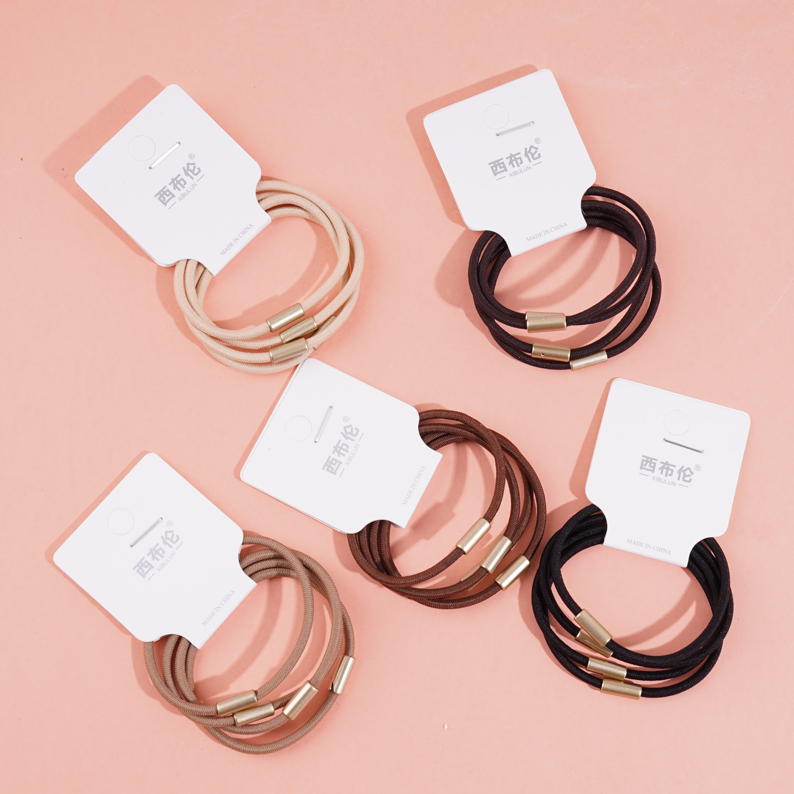 4 brown round beaded headbands made of elastic bands