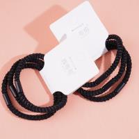 3 black dotted headbands with elastic bands