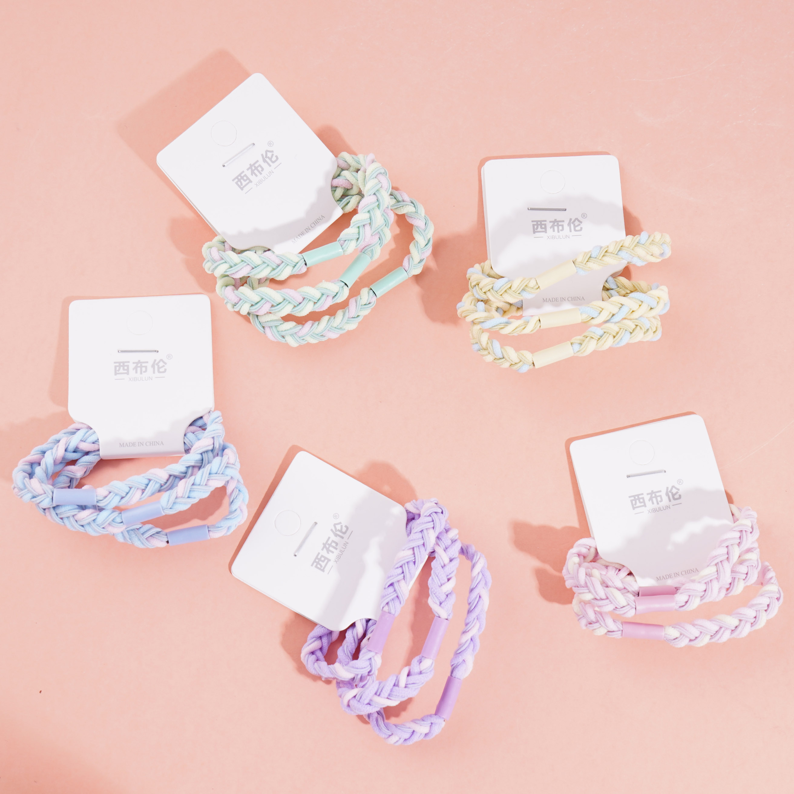 3 pieces of colorful flat cord with cord heads and rubber bands