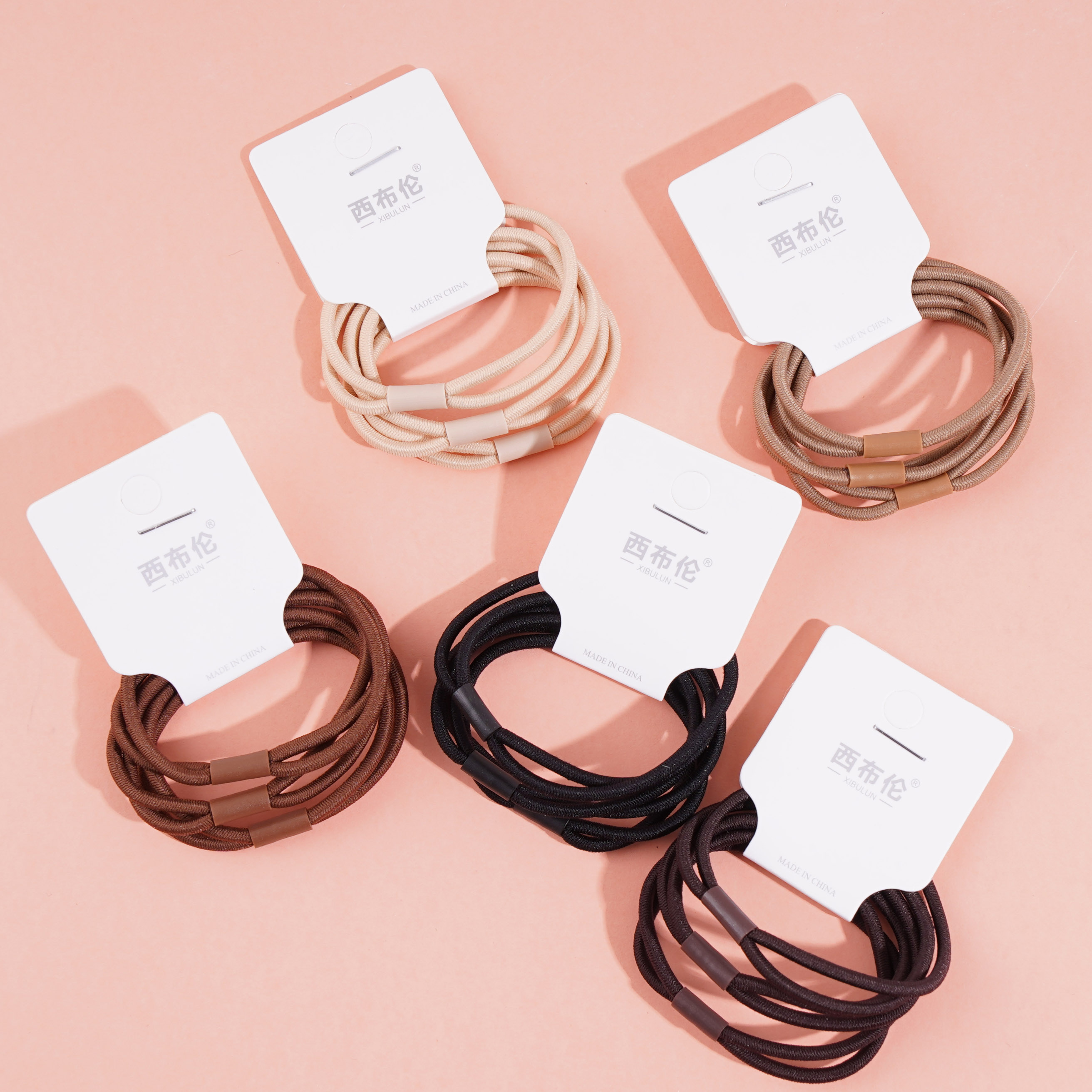 3 brown round tube head rope rubber bands