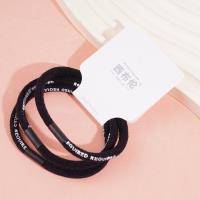 3 black letter-headed rubber bands