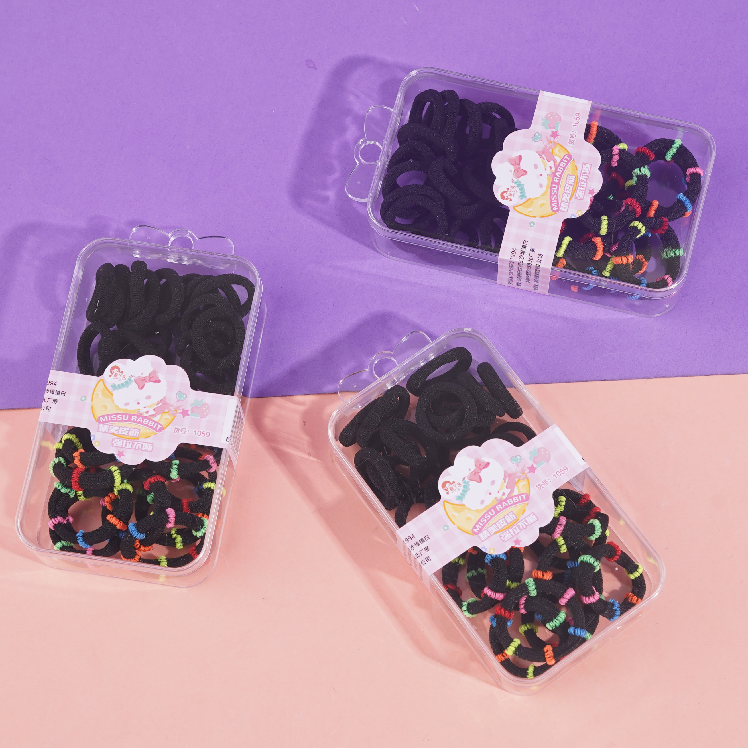 1059 two-compartment boxes with black rubber bands