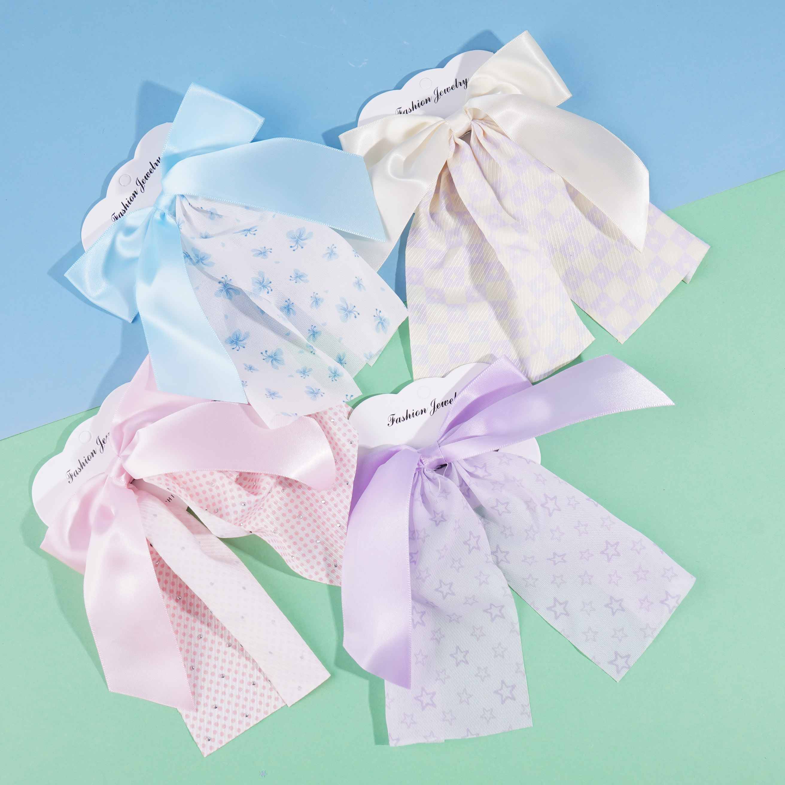 Pink two-tone bow tie duck clip