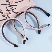 Fang Zhaoliang's braided headband with a bow-shaped decoration on it