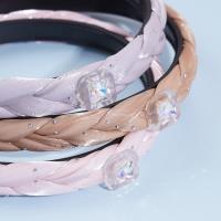 Fang Zhaoliang's braided headband with a bow-shaped decoration on it