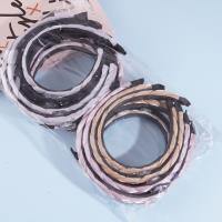 Fang Zhaoliang's braided headband with a bow-shaped decoration on it