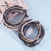 A square-shaped diamond-patterned headband buckle