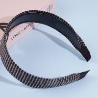 Wide-head buckle hair accessory with a clip-on design