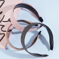 Wide-head buckle hair accessory with a clip-on design