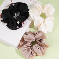 Satin pearl studded drill bit with floral patterned ring